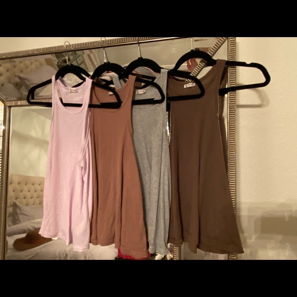 4 Free people Long Beach tank tops